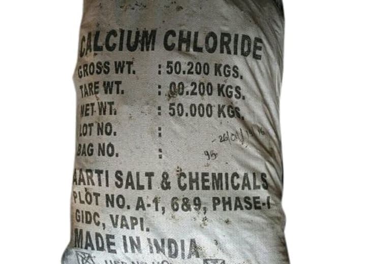 Calcium Chloride — White, odourless, hygroscopic powder or deliquescent crystals