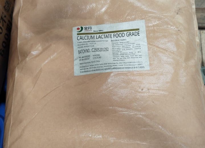 Calcium Lactate Food Grade — White or off-white, odorless crystalline powder or granules