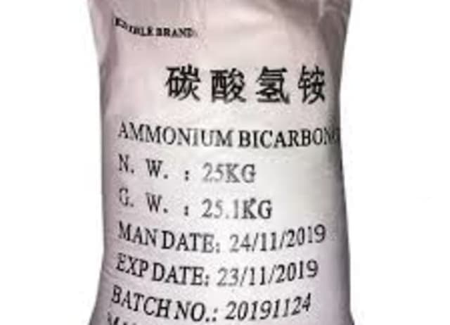 Ammonium Bicarbonate — White granular solid